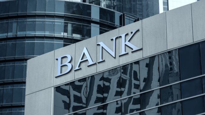 Close up of a bank sign on a building