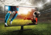 Sports fans concerned by amount of gambling ads Football kicked out of a TV inside a stadium