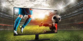 Sports fans concerned by amount of gambling ads Football kicked out of a TV inside a stadium