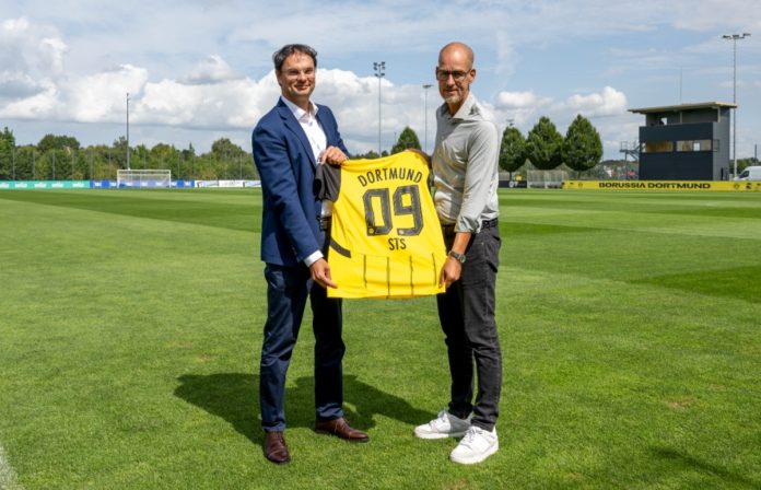 STS executive hold Borussia Dortmund shirt