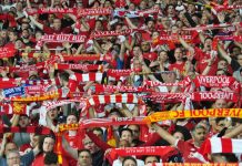 Fred Done: Liverpool fans have paid for my holiday for the last 25 years Liverpool fans holding up scarves