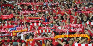 Fred Done: Liverpool fans have paid for my holiday for the last 25 years Liverpool fans holding up scarves