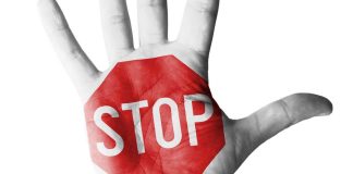 ASA orders social casinos to pull misleading TikTok ads Hand with stop sign painted on it