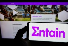 Entain Voices: Simplicity key to in-house studio success Entain logo on a phone screen