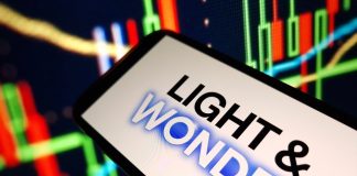 Light & Wonder ongoing lawsuit ‘disruption’ set to impact Q4 figures Light & Wonder logo on phone