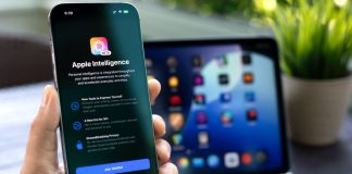 Apple suspends misleading AI news alerts following backlash Apple Intelligence logo on phone in front of laptop