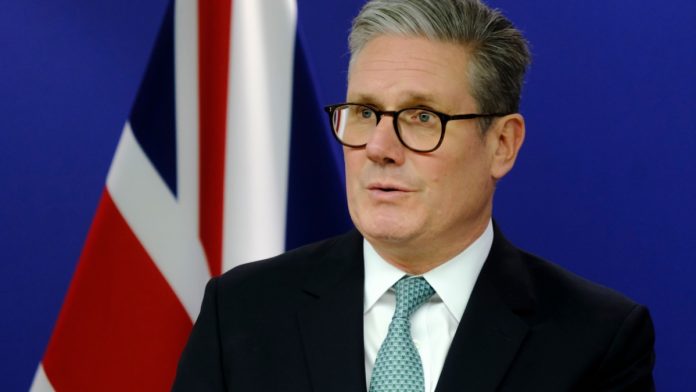 Keir Starmer in front of Union Flag