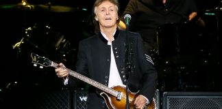 Paul McCartney issues UK government with AI warning Paul McCartney on stage