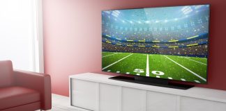 OpenAI to signal new age with Super Bowl Ad debut American football pitch on a TV